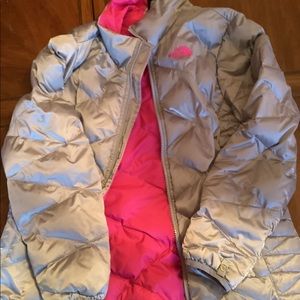 silver and pink north face puffer jacket